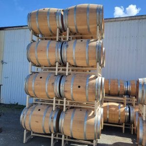Wine barrels on a palette stacked 4 high
